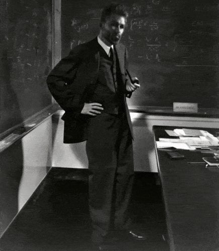 gigachad professor standing blackboard pipe suit equations